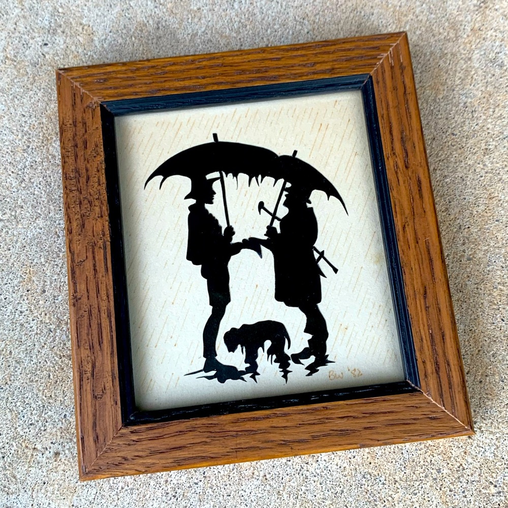 April Showers Poor Man buying dog from Rich Man Scherenschnitte Barb Welshofer